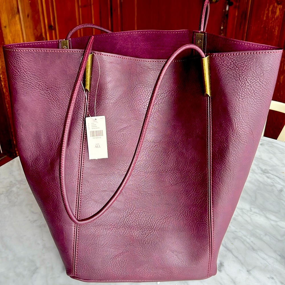 The Large Akimbo Tote Bag with matching zipper cosmetic case new with tags